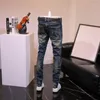 Pantaloni jeans da uomo elasticizzati strappati con fori Pantaloni da cowboy maschili Slim Fit per uomo Tubo stretto Denim estivo strappato skinny elastico rotto