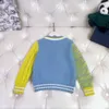 Cardigan per bambini di lusso Maglione per bambini con design di giunture di colore Taglia 100-150 abiti firmati per bambini Scollo a V Giacca per bambina lavorata a maglia Nov25