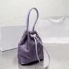 2024 Borsa di lusso da donna Borsa a secchiello con diamanti Borsa a mano del progettista Mini Totes Qualità lucida con strass Borsa a tracolla da donna Borsa a tracolla Borsa da donna Frizione Portafoglio