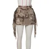 Kjolar kvinnor sommar sexig hög midja knapp skinny streetwear y2k 2023 vintage kamouflage tassel lapptäcke mini