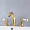 Rubinetti per lavabo Bagno Rubinetto per vasca in oro di lusso Doppi manici Miscelatore per lavabo a tre fori Ottone