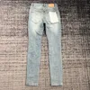Мужские джинсы мужские узкие эластичные с рваными краями синие 231130