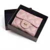 Portefeuilles de conception de luxe pour femmes Folde sacs à main en cuir véritable mode court argent pochette portefeuille loquet moraillon sac à main petit portefeuille X2202436