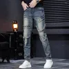 Jeans pour hommes 2023 Marque de mode Broderie Zipper Panneau de bord déchiqueté Rétro Portant la corde Version coréenne Demin