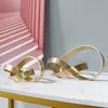 Nyhetsartiklar Nordiska heminredningar Tillbehör Modern Minimalist Metal Hollow Twisted Abstract Art Iron Living Room Desk Table Ornament 231129