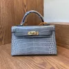 A Kaily Handsewn second-generation mini bag genuine leather hand-held crossbody women's crocodile pattern wax thread simple small one shoulder