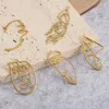 Charms 1pack Raw Brass Hollow Face Hand för örhängen som gör komponenter Pendants Diy Craft Handgjorda smycken Halsband Tillbehör