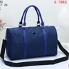 Designer Duffle Bags Luxury Designers Trefoil P Bag Handväskor Axel Nylon Womens Traveling Bowling Boston Väskor Mens Women Outdoor Handbag 2311302bf