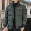 Piumino da uomo Parka invernale imbottito Giacca ispessita di grandi dimensioni Moda casual Gioventù Colletto in piedi Cappotto corto 231129