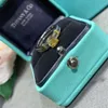 Blue Box Classic Designer TF Ring Top Internet Celebrity New High End Precision och mångsidig noggrann maskin DoubleLayer Zircon Four Claw Yellow Diamond