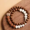 Strand handgemachtes goldenes Sandelholz buddhistisches Perlenarmband mit weißer Jade Vajra und Bodhi-Holz zum Schutzsegen