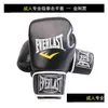 Équipement de protection Nouveaux gants de boxe Hommes Femmes Sandbag Combat Professionnel Sanda Pu Enfants Adt Formation Spécial Drop Livraison Sports Dhfjv