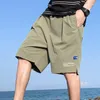 Shorts masculinos de verão casual tendem a corrida esportiva de beisebol da cintura elástica masculina de roupas de praia frouxas