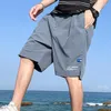 Shorts masculinos de verão casual tendem a corrida esportiva de beisebol da cintura elástica masculina de roupas de praia frouxas