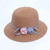 Sombreros de ala ancha 2-8 años Baby Girl Kids Sombrero de paja Sombrero de sol Playa de verano con flor Khaki Beige Blanco Rosa Tamaño 54 cm