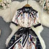 Robes décontractées 2023 été à manches courtes noeud papillon revers vacances robes florales femmes élégant Vintage chaîne imprimé plissé fête Midi Vestidos