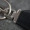 Mens Designer Key Rings Unisex Luxury Keychain Fashion Sworm Charm Luxury Chepchains кошелька подвесной автомобиль Кольцо кольцо черное сети аксессуары цепочки