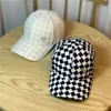 Bollkåpor Koreansk version av ins svartvitt checkerboard diamant m baseball mössor utomhus solskydd höst och vinter casual hatt g230201