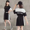 Esgro de meninas de 6 a 16 anos Camisa infantil 2022 Novo vestido de algodão adolescente de verão branco e preto retalhos de retalhos com cintura #6158 0131