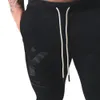 Herrbyxor Autumn Casual Men joggar Sweatpants mode lapptäcke byxor manlig gym fitness träning bomull som kör sport spårbyxor 230131