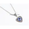 Pendant Necklaces Fashion Jewelry Hollow Out Heart Evil Eye Necklace Blue Eyes Drop Delivery Pendants Dhml7