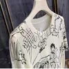 Maglietta da donna Fine imitazione lana lavorata a maglia Maglietta da donna a maniche corte Top Graffiti Digital Jacquard Pullover Maglione da donna 22 Estate Trendy 230131