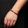 Strand Natural Tiger Eye Stone Pärlor Armband 8mm Lava Buddha Head Charm Armband Energy Healing Yoga For Men Women smycken