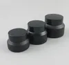 الجملة 20 × 15G 30G 50G Frost Black Make Up Glass Jar with Black Lids White Seal Container Cosmetic Packaging