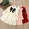 Vestidos de menina meninas de meninas vestidos de Natal 26 anos outono inverno crianças malha vestido de manga longa bow moda modern vestido de garotas roupas