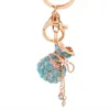 Porte-clés créatif nouveauté opales sac à main Design femmes sac pendentif à breloque mode porte-clés porte-anneau Crysatl porte-clés chaînes de voiture
