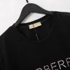 Designer de luxe T-shirt marque t-shirt Vêtements lettre de pulvérisation à manches courtes printemps marée d'été hommes et femmes tee-shirt polo Taille M-3XL