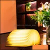 Other Home Decor Creative Portable 10X8X2.5Cm Usb Rechargeable Book Shape Lights Living Room Wood Folding Kids Gift Desk Lamp Dh1064 Dhamx