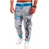 Heren broek heren mode trekstring elastische taille kleurblok letter print sport lente zomer los ademende jogging mannen 230202