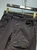 Męskie dżinsy mężczyźni żebrowane skórzane plaster elastyczne chude, zaniepokojone czarne dżinsy