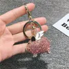 Llaveros Diamond Flying Piggy llavero para mujer bola de pelo anillo de coche pareja pequeño regalo mochila joyería colgante luz de lujo Fred22