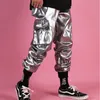 Calça masculina de couro casual harém masculino de rua masculino Hip Hop punk prata multi bolso Cargo calça roupas de palco DJ Singer Men 230202
