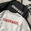 Camisetas masculinas 2023 Novo humano fabricado com manga longa Homens de manga de retalhos de retalhos Camista G230202