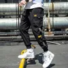 Męskie spodnie S-5xl Hip Hop Joggers Man Man Sweatpants Streetwear Men Harem Multi-Pocket Ribbony swobodne męskie spodnie 2023