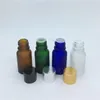 Bottiglie di stoccaggio Bottiglia da viaggio 10 ml Verde blu ambra Fiale di vetro smerigliato trasparente Olio essenziale con tappo in alluminio 200 pz / lotto