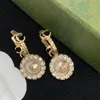 Sunflower-shaped gold-plated logo charm earrings designer for women. Luxury earings designer jewelry. fashion brand aretes. Wedding Party bride gift ornament with box