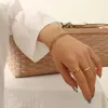 リンクブレスレットチェーン高品質の女性18kゴールドメッキブレスレットステンレス鋼の時計バングルジュエリーリンク