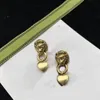 Löwenkopf-Herz-Charm-Ohrringe. Antikvergoldete Bronze. Luxuriöse Designer-Ohrringe für Damen. Hochzeitsgeschenke, Brautgeschenke, Designer-Schmuck