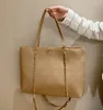 ChaneI Luxurys Designers Bags Fashion Tote Bag Sacs à main Sacs à bandoulière en cuir véritable Logo en métal simple Sacs à main pour femmes et sac à main Grande capacité Cartable 36X28X7CM