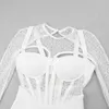 Casual Dresses Black White Sexig Se genom Women's Dress 2023 Spring Design spets sömmar långärmad smal rygglös mittkalv