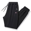 Men's Pants Casual Men Fitness Sportswear Tracksuit Bottoms Skinny Sweatpants Trousers Gyms Jogger Track Mens Joggers M-8XL K340