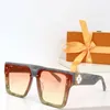 Óculos de sol designer Marca Z2257 Design UV400 Óculos de moldura de ouro metálico Men e mulheres espelham lentes de vidro Óculos de sol para olho de gato