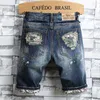 Jeans Masculino Shorts de Marca de Moda Masculino Buraco Personalidade Verão Estilo Coreano Jeans Rasgados Para Calças Finas Meias de Motocicleta