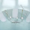Bracelets de cheville bohême multicouche serrure serpent chaîne cheville pour femmes tendance perle pendentif pied Bracelet plage bijoux
