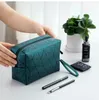 Bolso de diseñador Bolsos de cosméticos de PU Bolsos de mano Bolso de lavado de viaje simple Bolsos de almacenamiento femenino Bolso de lavado de maquillaje plegable Bolso de viaje Monedero de gran capacidad Carteras al por mayor