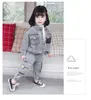 衣料品セットベビーガールズの服1〜7歳の春と秋の2ピースセットデニム大きなポケットウォッシュカラーボタン印刷